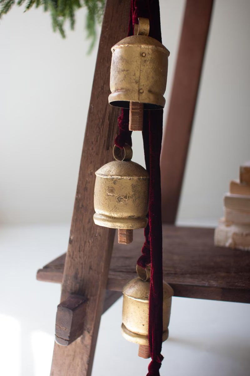 The Door Bells, a cluster of jingle bells on a velvet ribbon